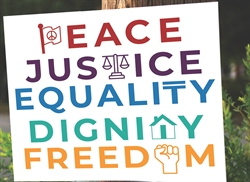 [ai] A sign on a wooden post with bold letters displaying the words "Peace, Justice, Equality, Dignity, Freedom" in various colors, surrounded by greenery.